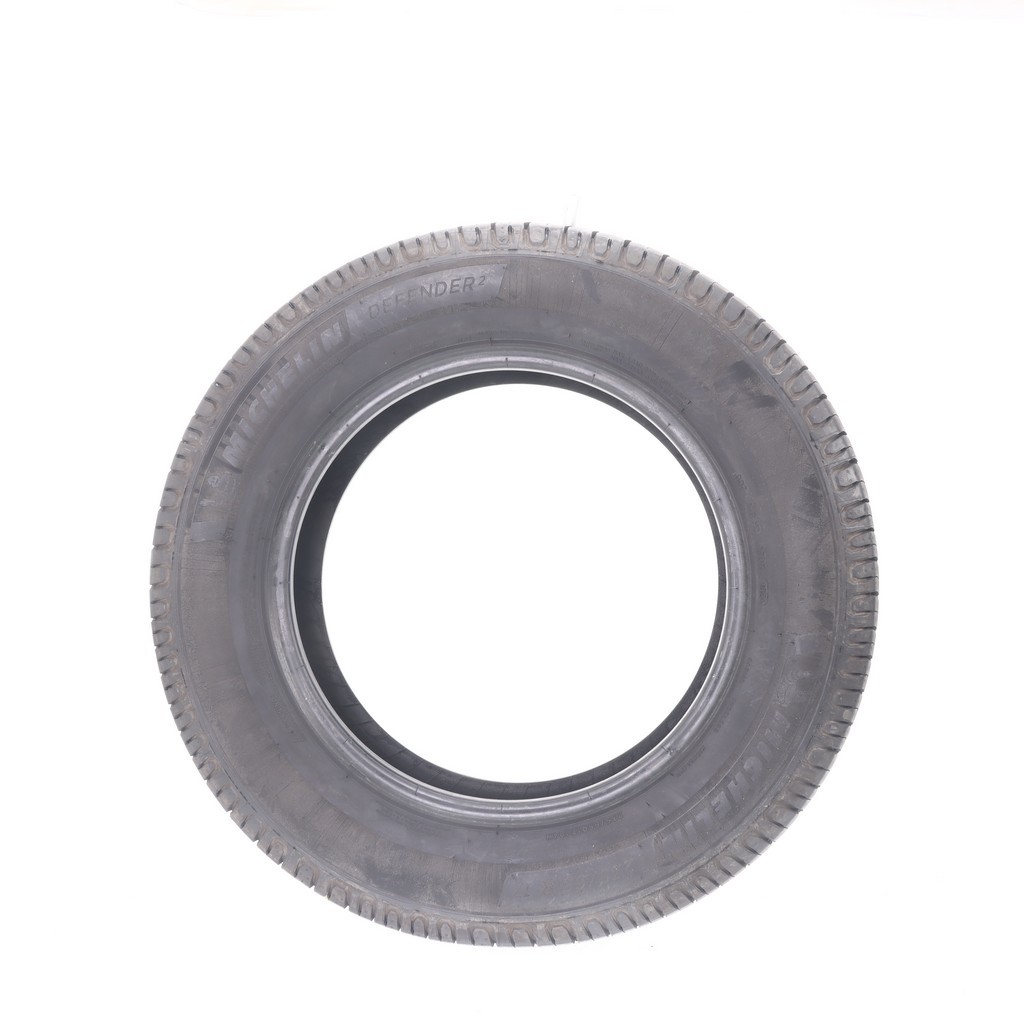 Set of (4) Used 235/65R17 Michelin Defender 2 104H – 9-10/32