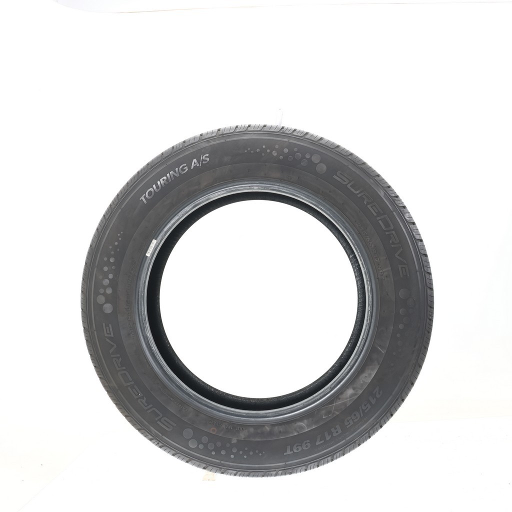 Set of (4) Used 215/65R17 SureDrive Touring A/S TA71 99T – 7-8/32