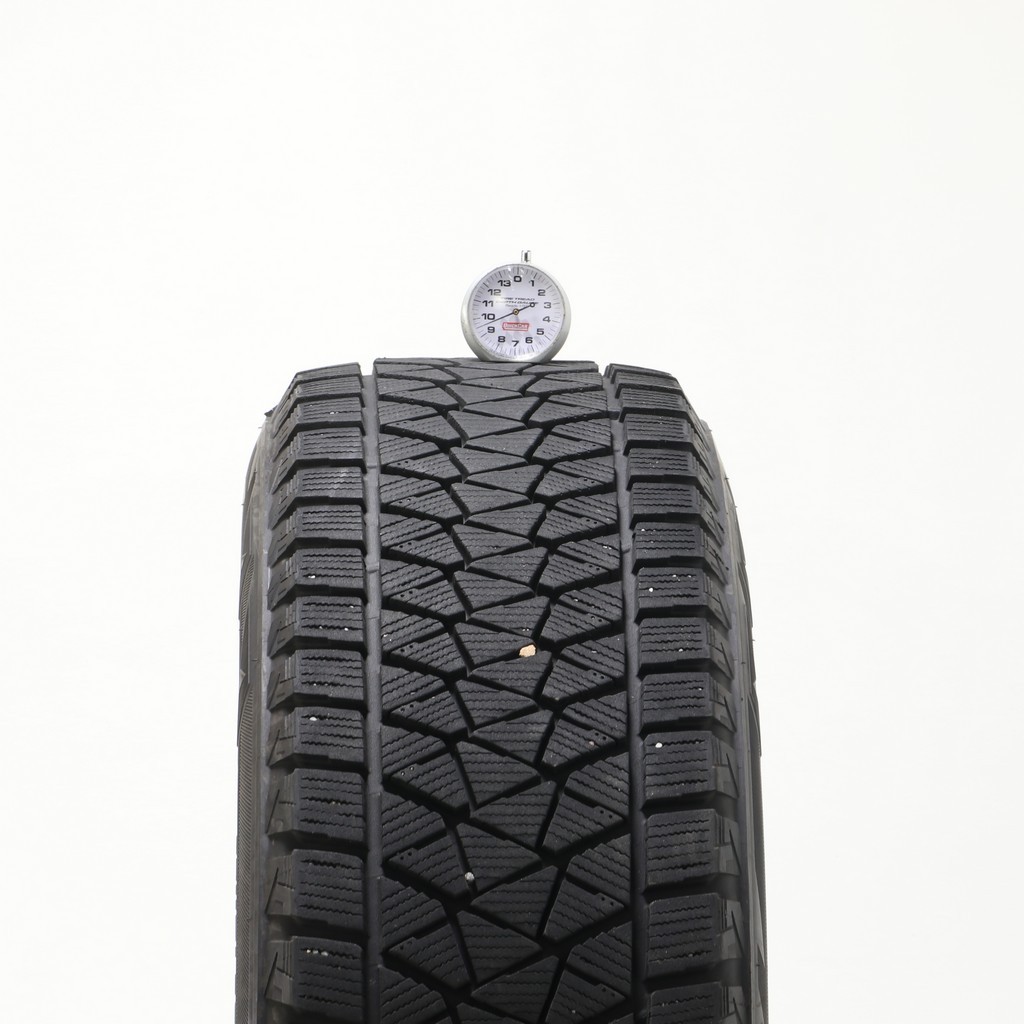 Set of (4) Used 225/65R17 Bridgestone Blizzak DM-V2 102S – 9.5-11/32