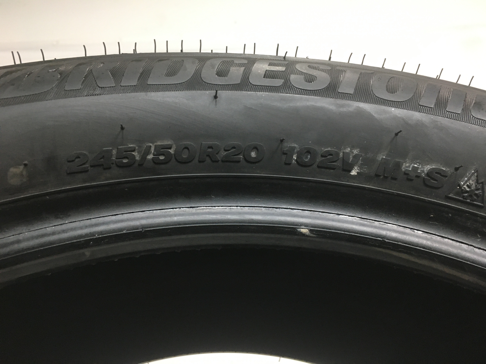 [1] Bridgestone WeatherPeak P245/50R20 245 50 20 Tire – Driven Once