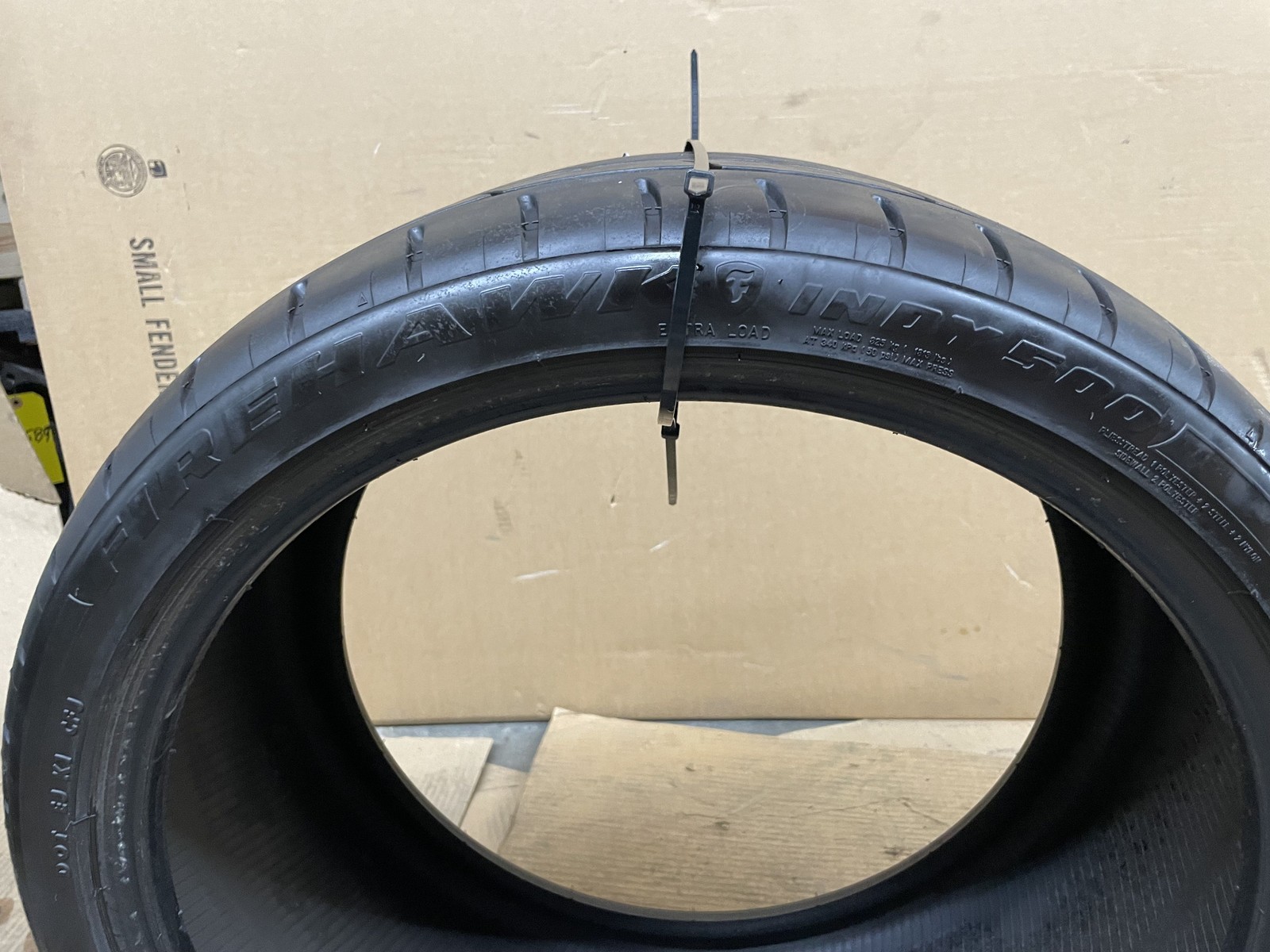 (A) FIRESTONE FIREHAWK INDY 500 295/30R20 93W 7/NDS DOT 1323