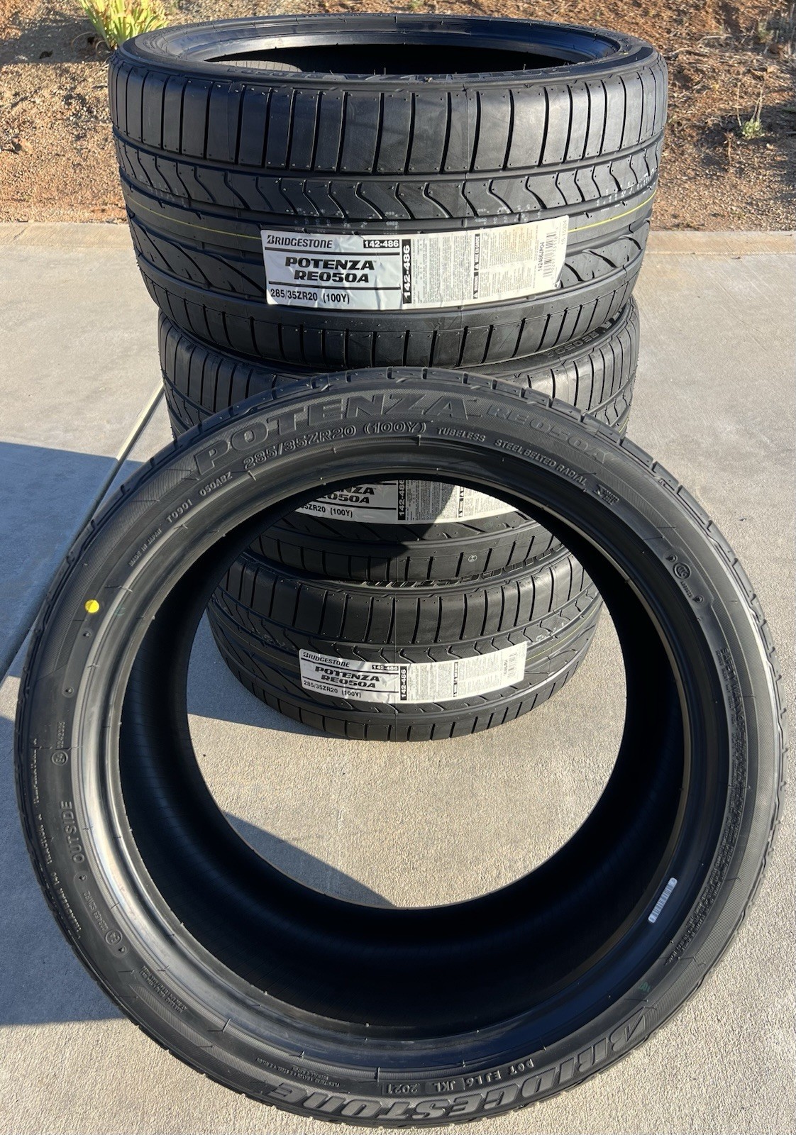 Set of FOUR BRAND NEW 285/35ZR20 Bridgestone Potenza RE050A Tires 2853520