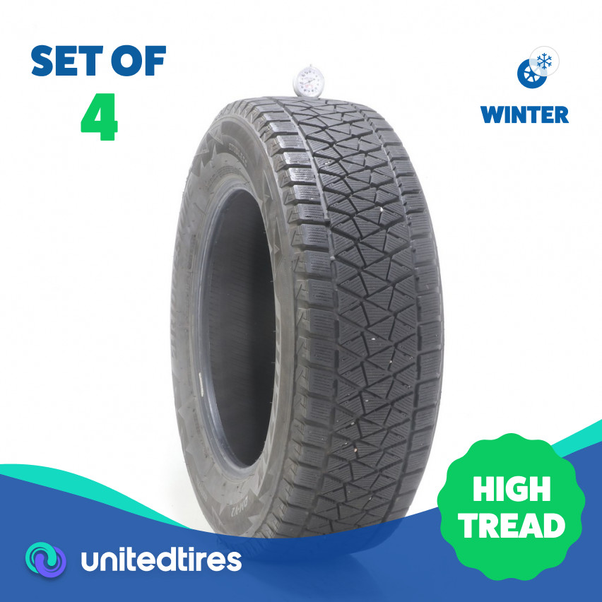 Set of (4) Used 235/65R17 Bridgestone Blizzak DM-V2 108S – 9.5-11/32