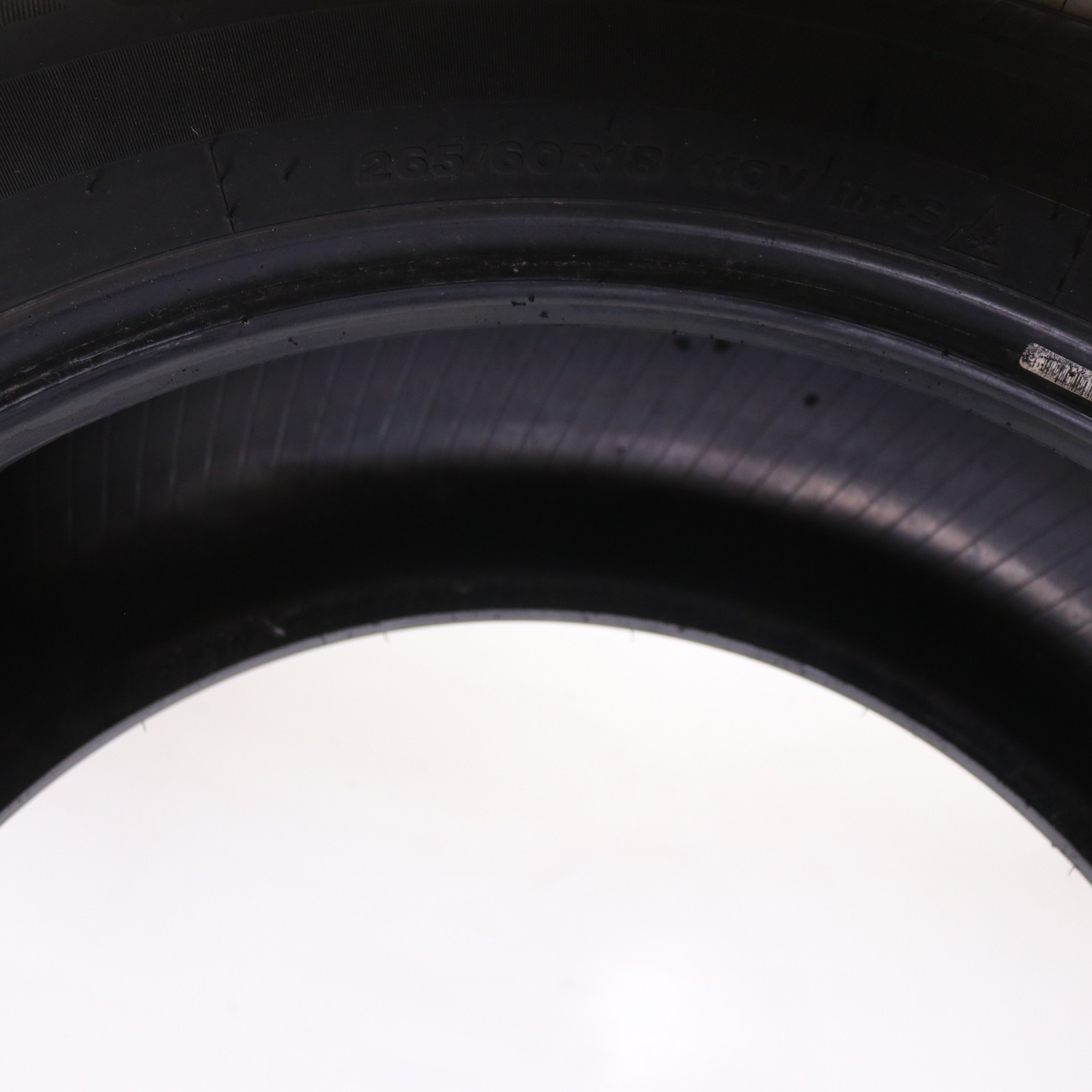 Set of 2 Used 265/60R18 Bridgestone WeatherPeak – 110V – 8-9/32