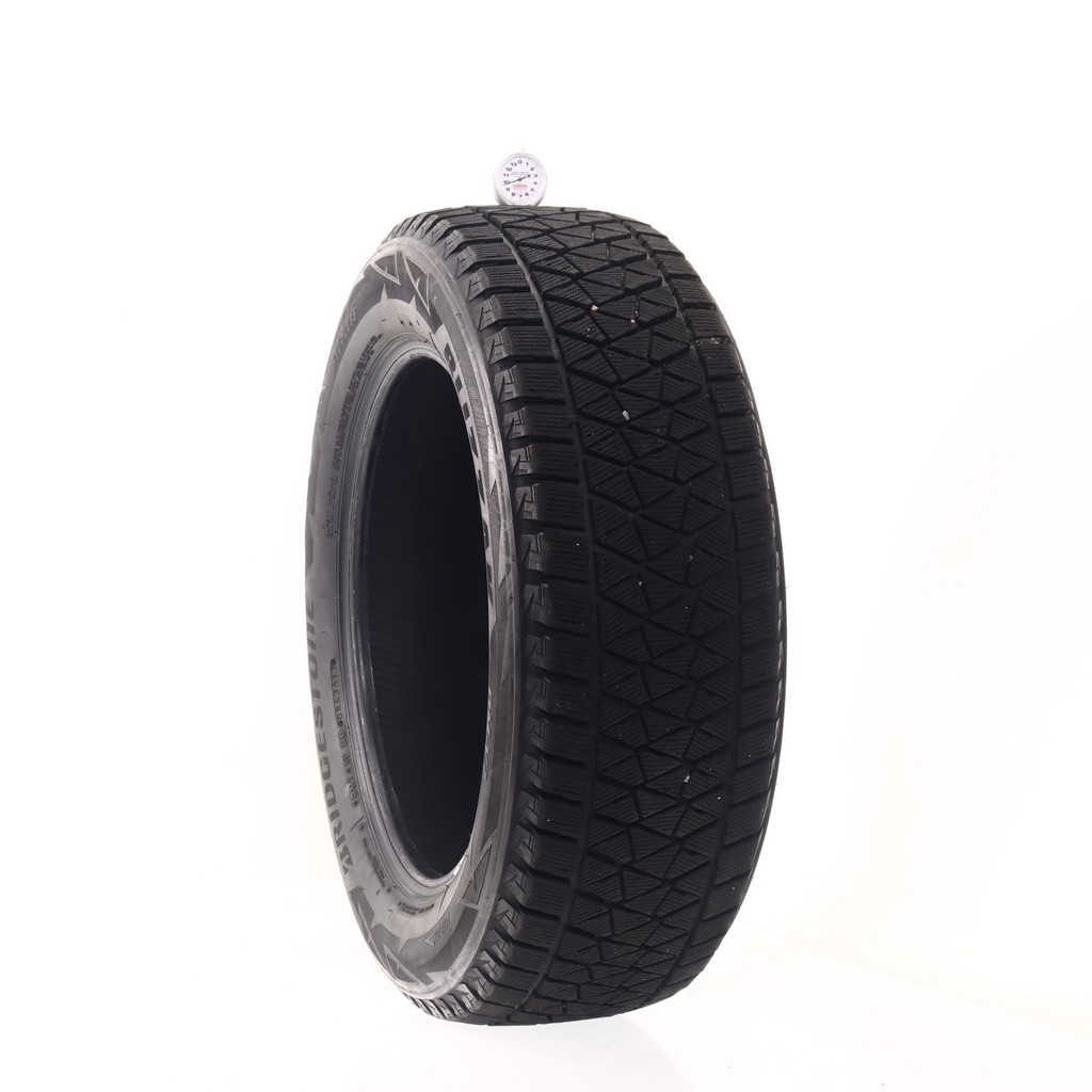 Set of (4) Used 235/60R18 Bridgestone Blizzak DM-V2 107S – 9.5-11/32 (XAVB)