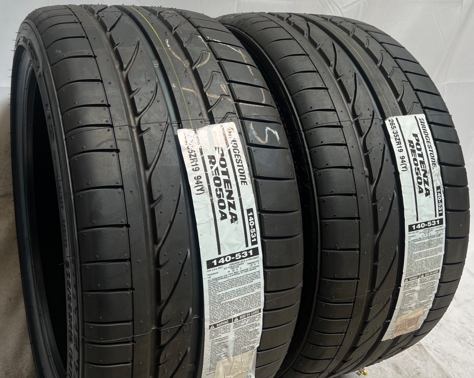 2 – NEW 265/35ZR19 (94Y) Bridgestone Potenza RE050A (N1) Porsche OEM – 7147