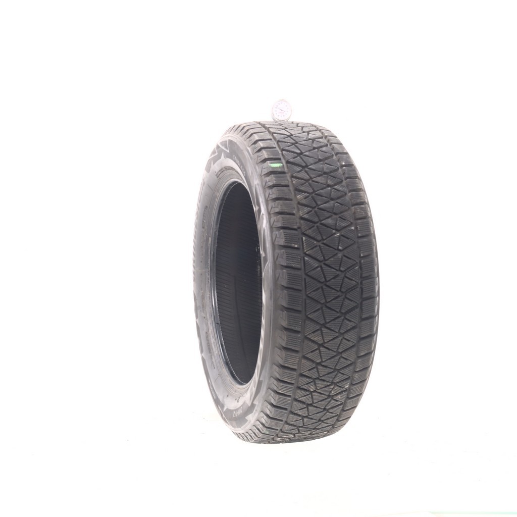 Set of (4) Used 235/60R18 Bridgestone Blizzak DM-V2 107S – 9.5-11/32 (XAVB)