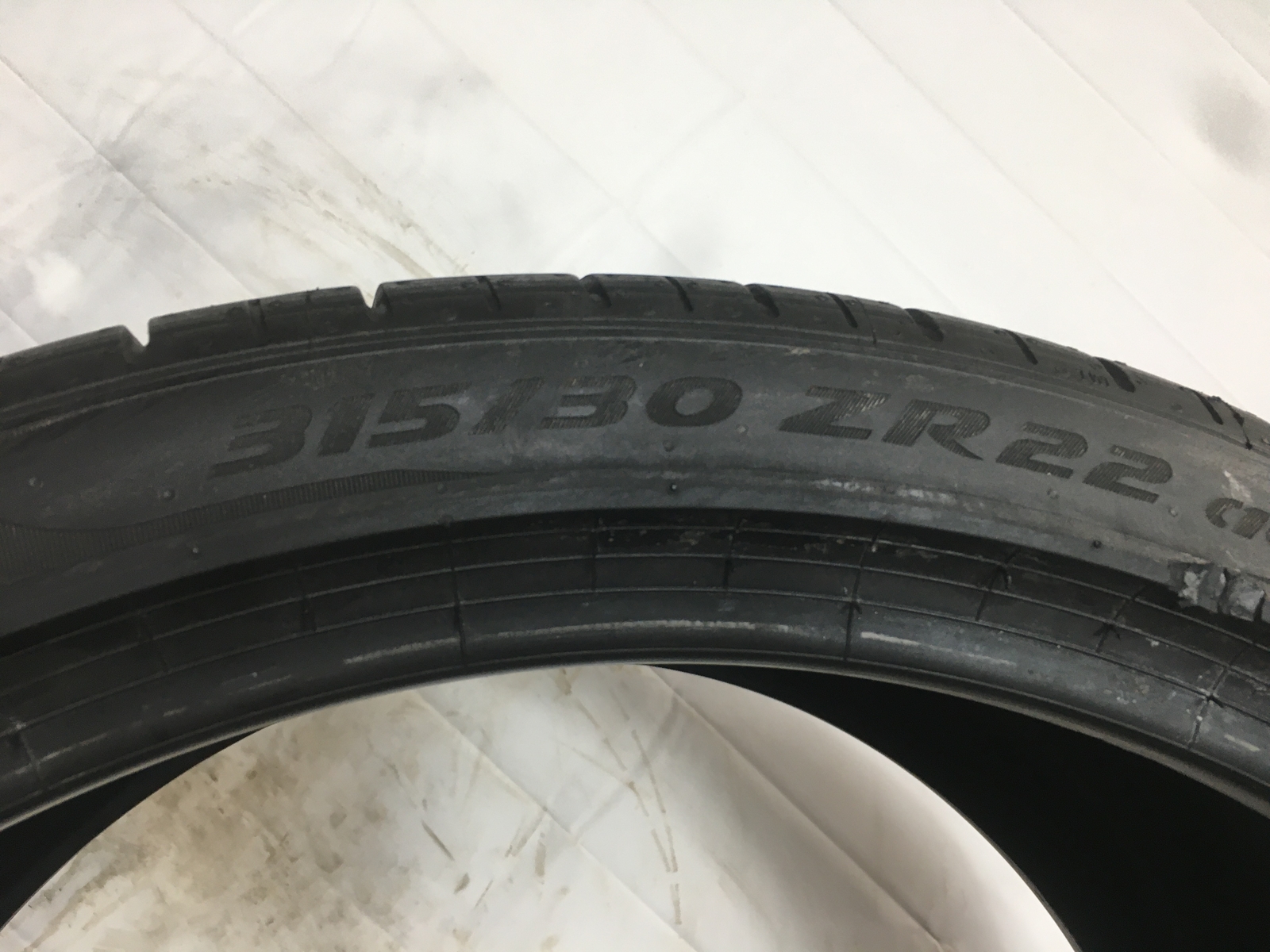 [1] Pirelli P Zero PZ4 P315/30ZR22 315 30 22 Tire – Driven Once