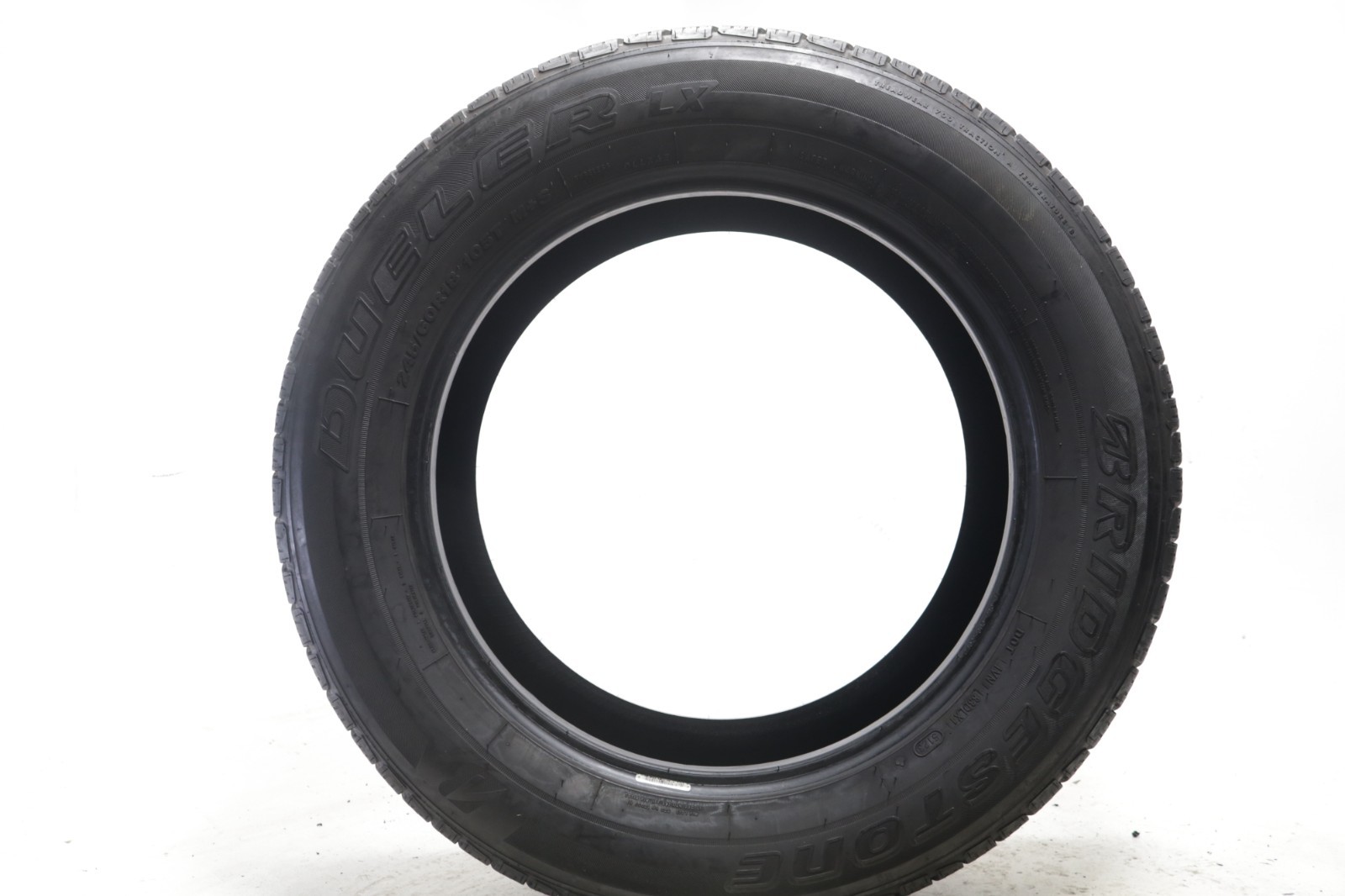 Set of 4 Used 245/60R18 Bridgestone Dueler LX – 105T – 8.5-9.5/32