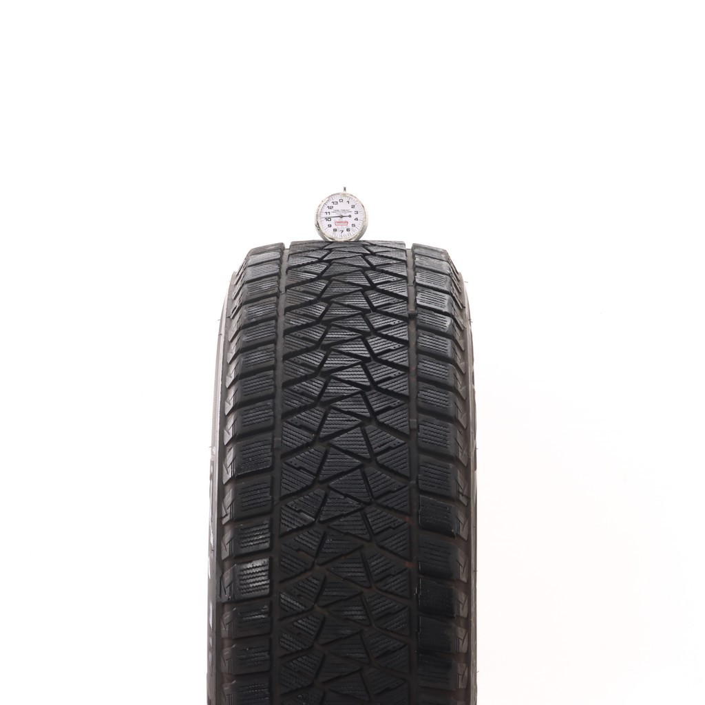 Set of (4) Used 235/65R17 Bridgestone Blizzak DM-V2 108S – 9.5-11/32
