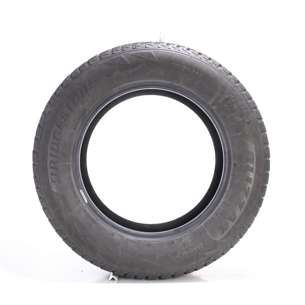 Set of (4) Used 235/65R17 Bridgestone Blizzak DM-V2 108S – 9.5-11/32