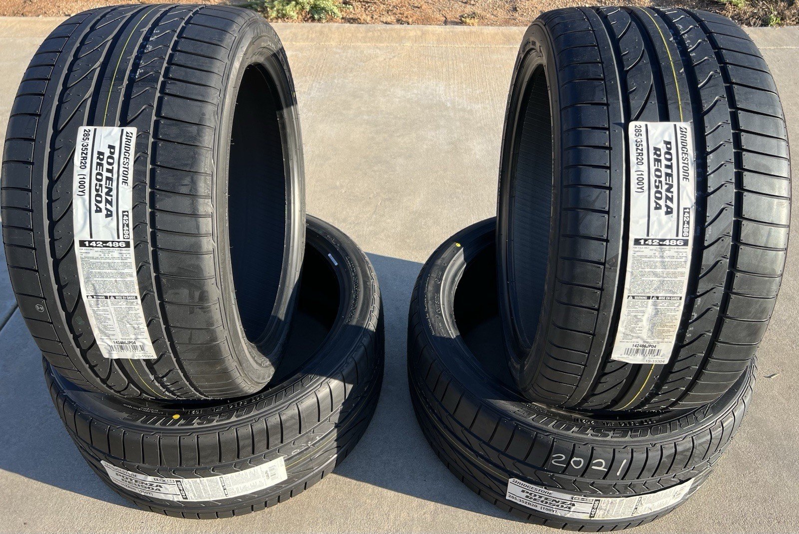 Set of FOUR BRAND NEW 285/35ZR20 Bridgestone Potenza RE050A Tires 2853520