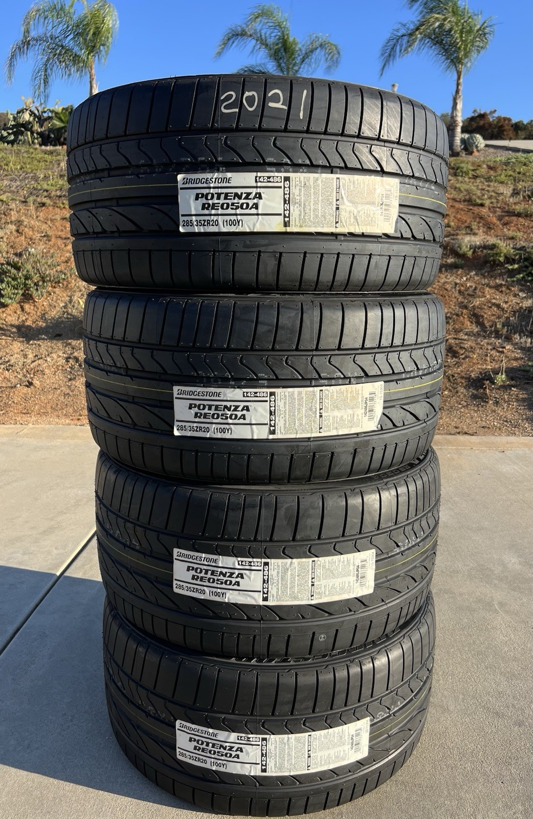 Set of FOUR BRAND NEW 285/35ZR20 Bridgestone Potenza RE050A Tires 2853520