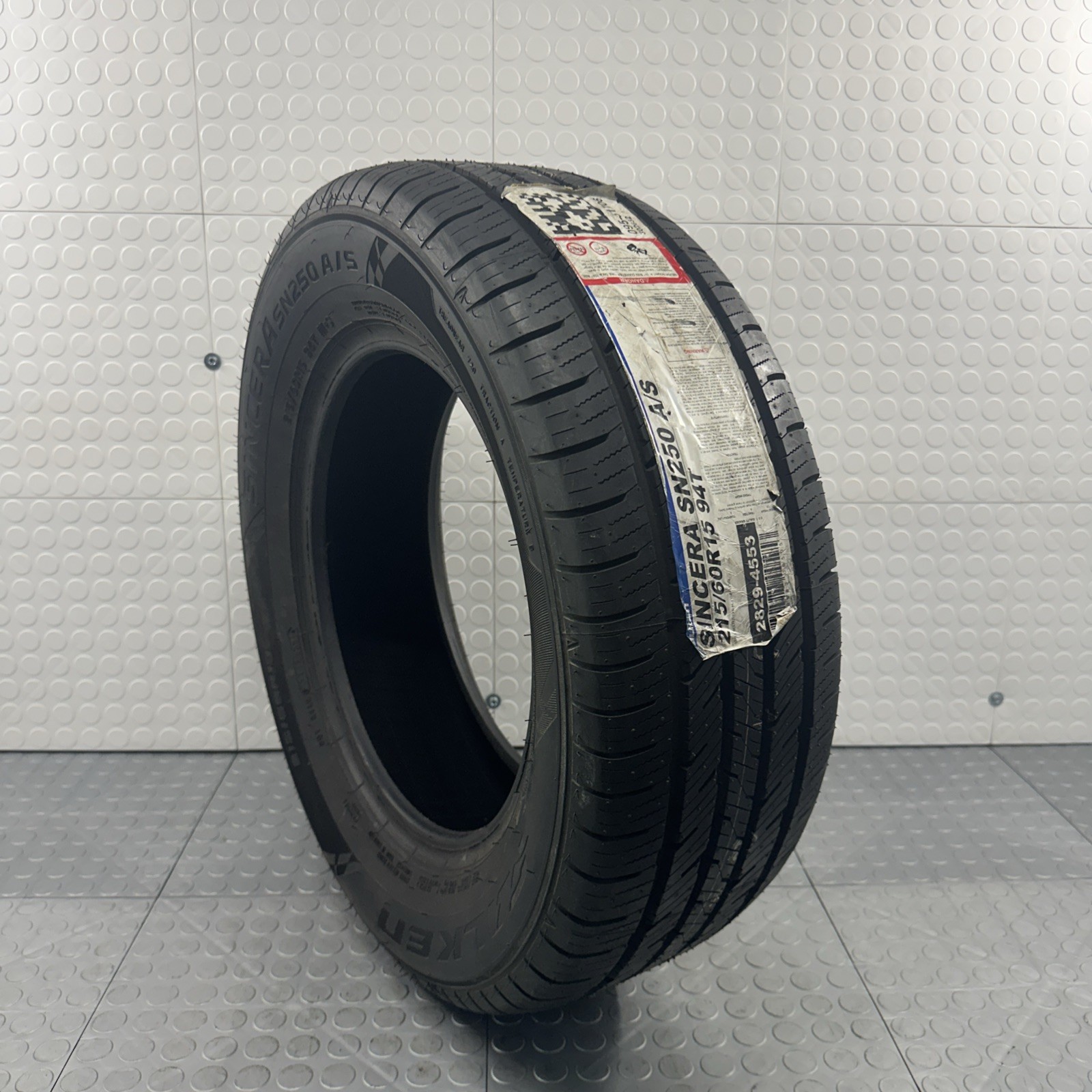 One (1) New Tire Falken Sincera SN250 A/S 215/60R/15 94T