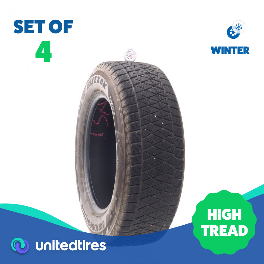 Set of (4) Used 235/65R17 Bridgestone Blizzak DM-V2 108S – 9-11/32 (19CXI)
