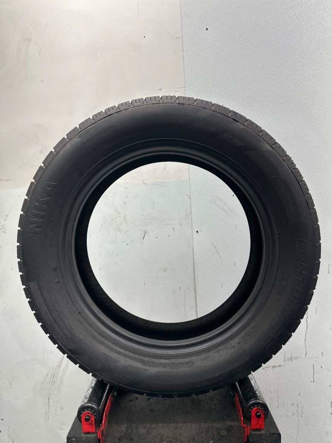 1 Used P215/60R17 Nika Conture AS 100 V – 9/32