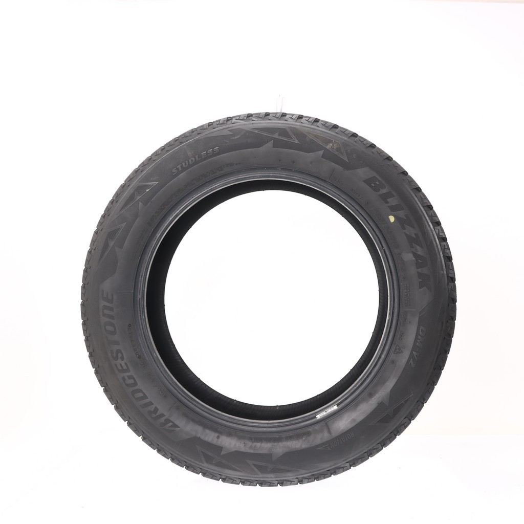 Set of (4) Used 235/60R18 Bridgestone Blizzak DM-V2 107S – 9.5-11/32 (XAVB)