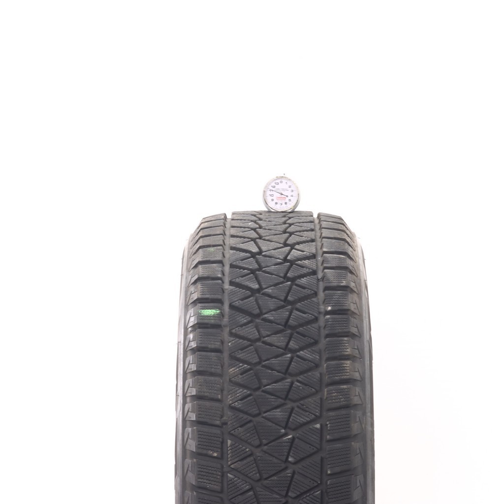 Set of (4) Used 235/60R18 Bridgestone Blizzak DM-V2 107S – 9.5-11/32 (XAVB)