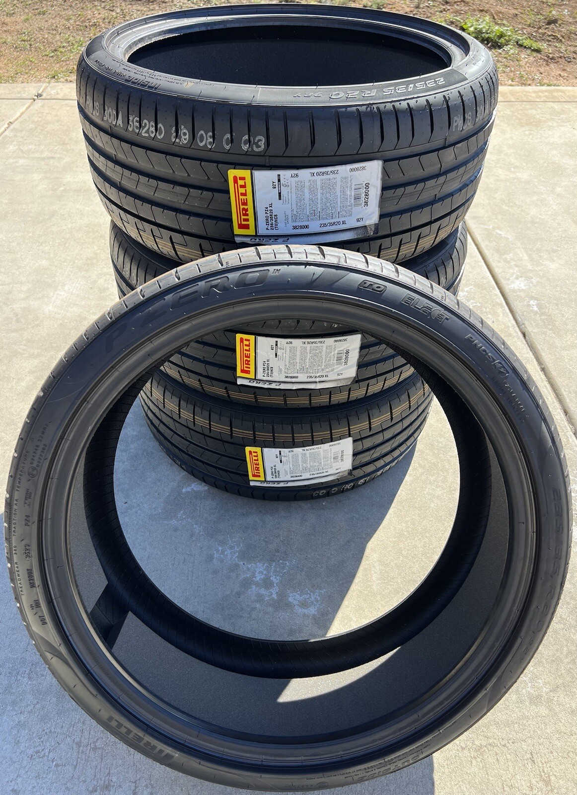 Set of FOUR BRAND NEW Pirelli P Zero PZ4 235/35R20 92Y T0 Tesla ELECT PNCS Tires