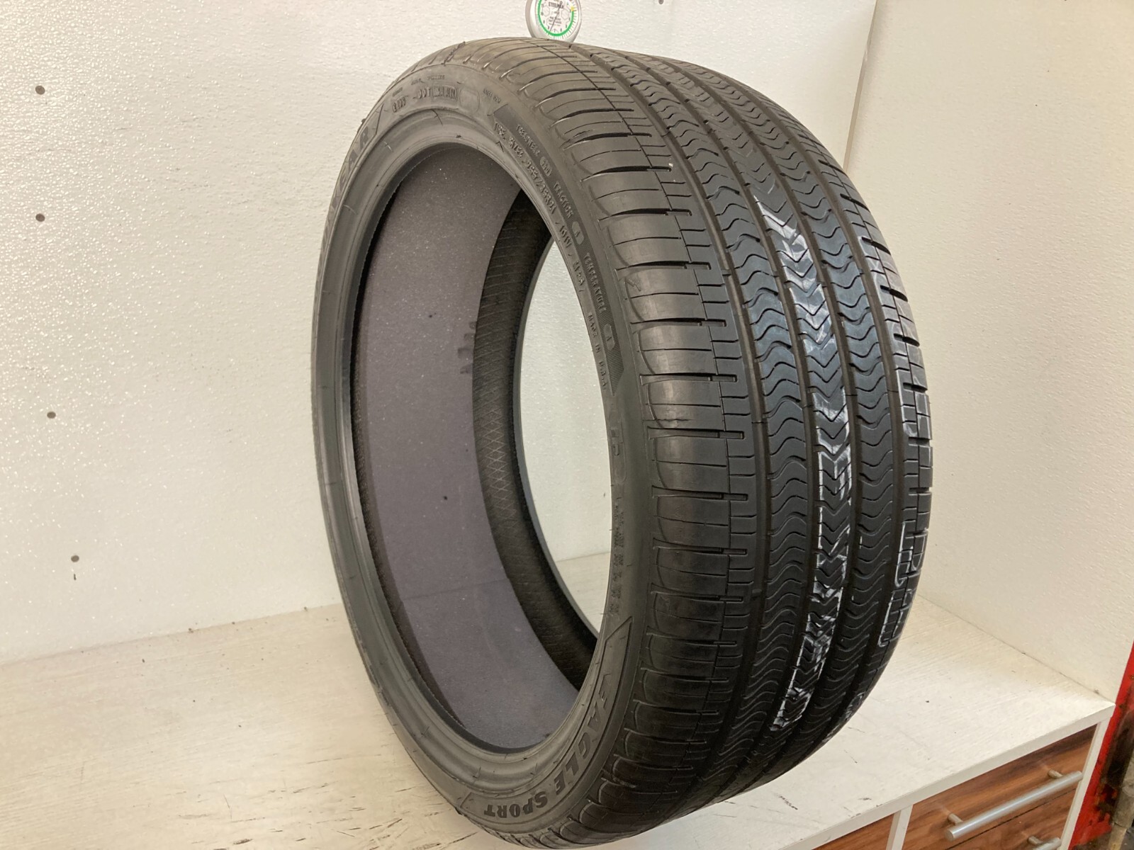 1 Tire 265 35 21 Goodyear Eagle Sport A/S Tesla (7.0-7.8/32 Tread) 101V