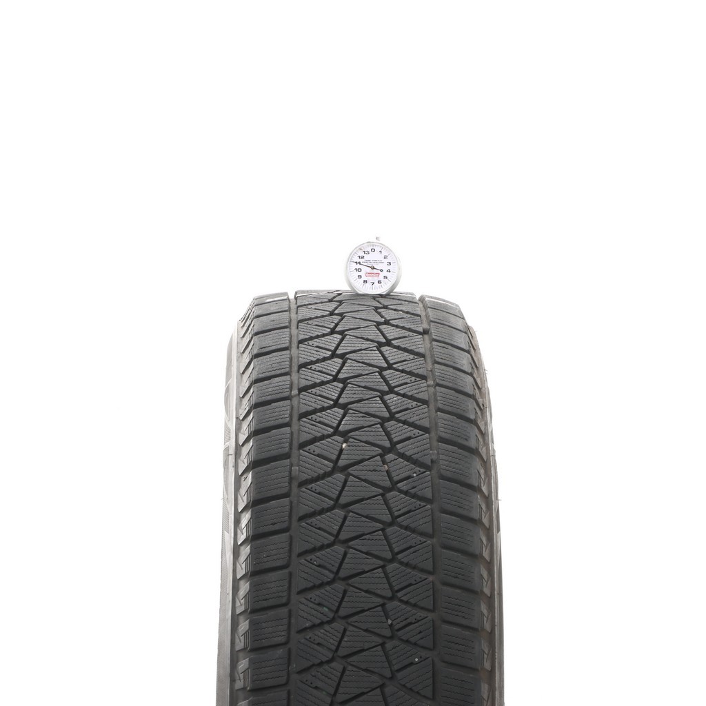 Set of (4) Used 225/65R17 Bridgestone Blizzak DM-V2 102S – 9.5-11/32